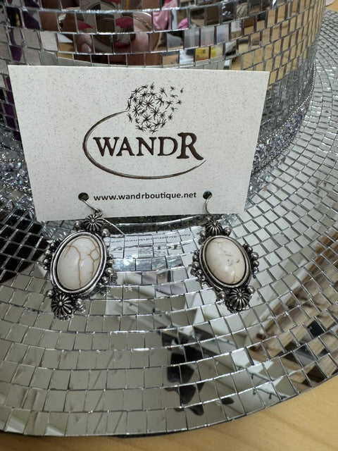 Pretty Howlite framed in silver tone dangle earrings
